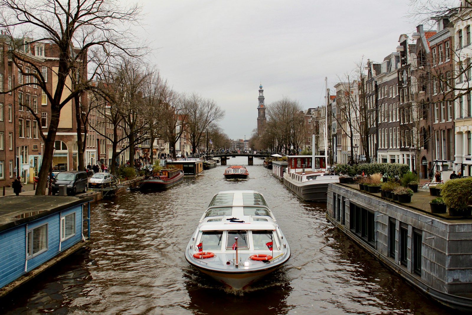 white and red boat on river during daytime